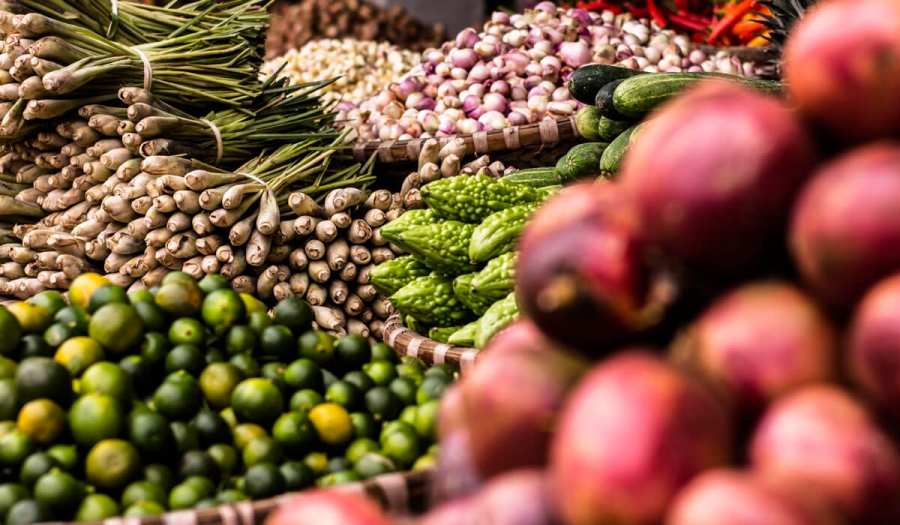 Red Onions Beside Bitter Gourd